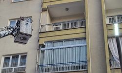 Çorum'da balkon filesine takılan güvercini itfaiye ekibi kurtardı