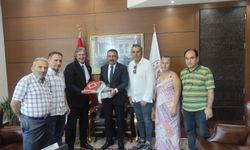 GAZETECİLERİN KONUT PROJESİNE DESTEK