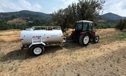 Bolu'da tarlada çalışan biçerdöverlere su tankerleri eşlik ediyor