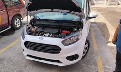 Tokat'ta otomobilin motoruna sıkışan kedi kurtarıldı