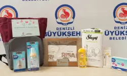 Denizli'de ailelere bebek bezi ve çanta desteği