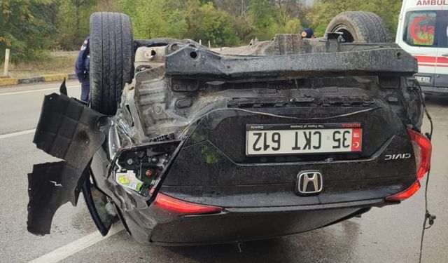DEVRİLEN OTOMOBİLİN SÜRÜCÜSÜ YARALANDI